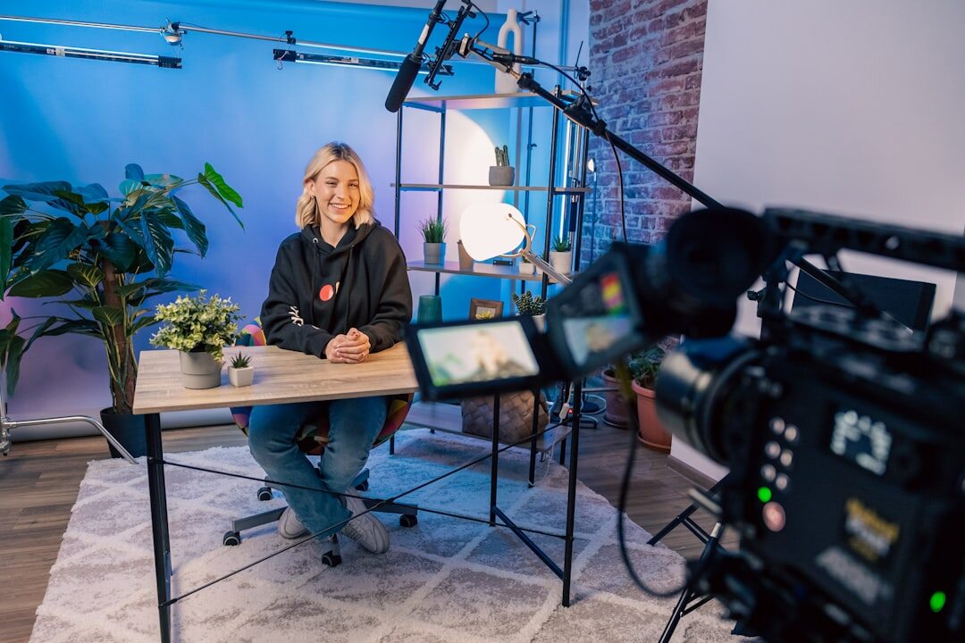 Wide shot of professional news broadcasting studio with professional equipment